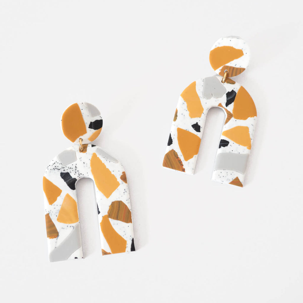 Large statement Terrazzo Arch Earrings in Mustard, black and white by Fison Zair 