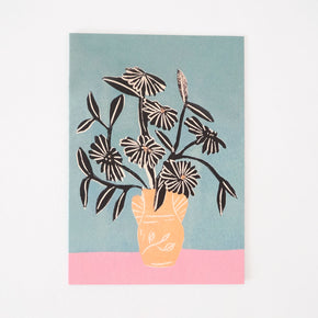 Greeting card featuring beautiful blooms in a peachy vase.