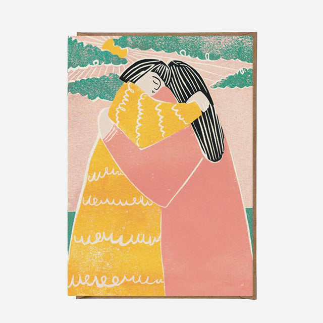 Warm Hugs Greeting Card by Luiza Holub featuring two people sharing a hug in warm pink and yellow colours